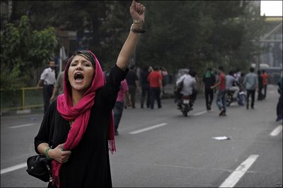 woman-protester-raises-fist1